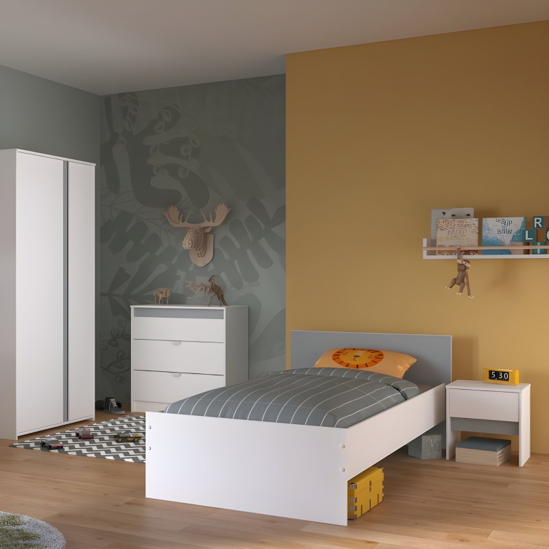 Cama infantil blanca con cabecero gris y almacenaje amarillo en dormitorio de ambiente