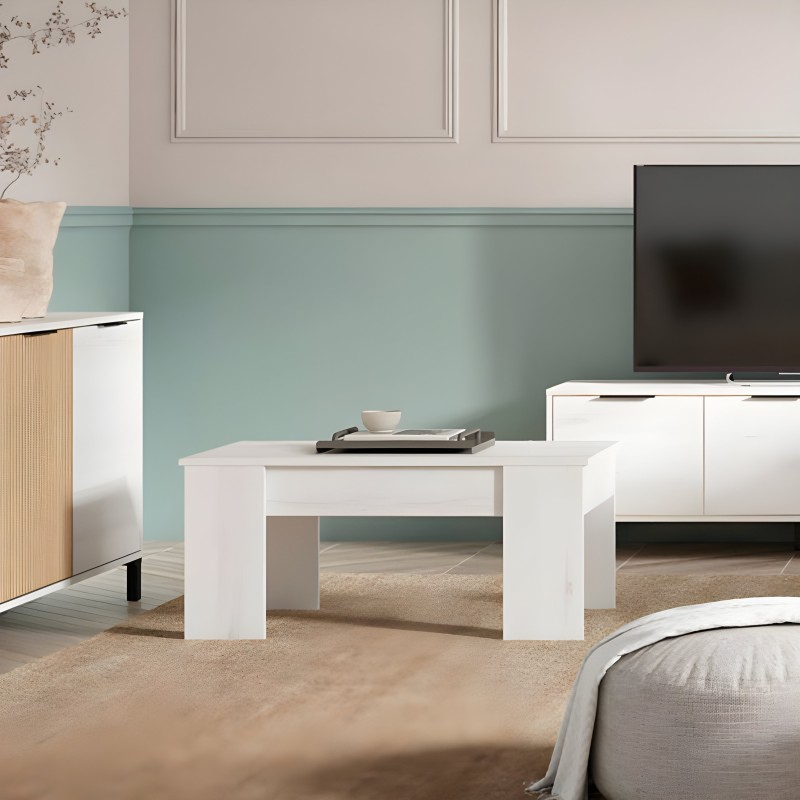 Mesa de centro blanca con tablero liso y estructura de bloques en ambiente de salón moderno