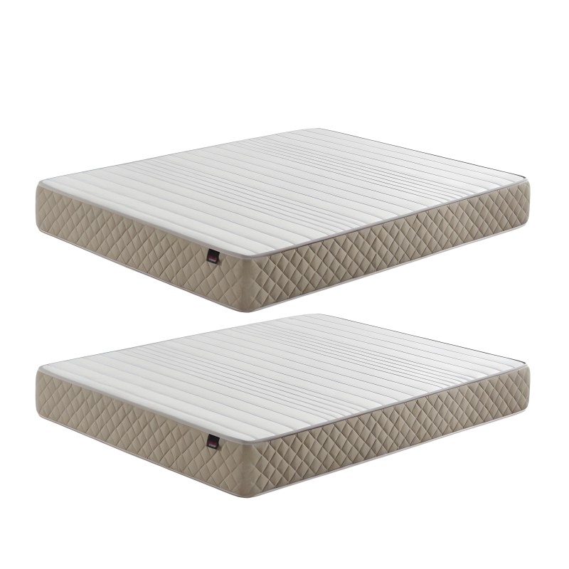 Colchón acolchado beige y blanco con núcleo de espuma y costuras lineales en la superficie superior