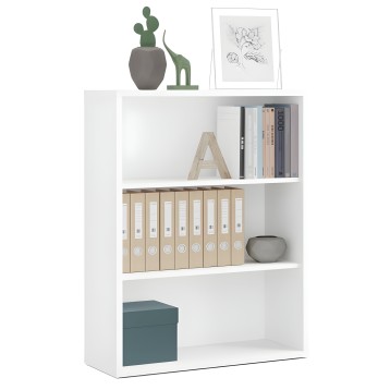 Estantería blanca de varios compartimentos con libros y cajas de almacenaje decorados