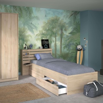 Cama individual de madera clara con cabecero y cajones de almacenaje integrados en ambiente juvenil tropical