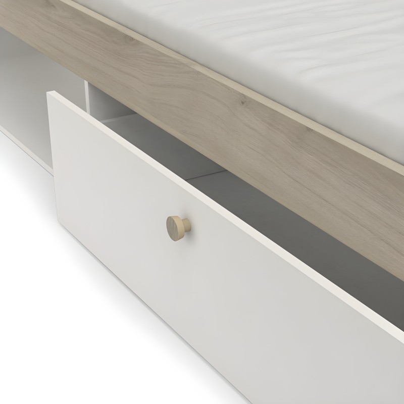 Detalle de cajón abierto en mueble con frente blanco y tirador de madera natural