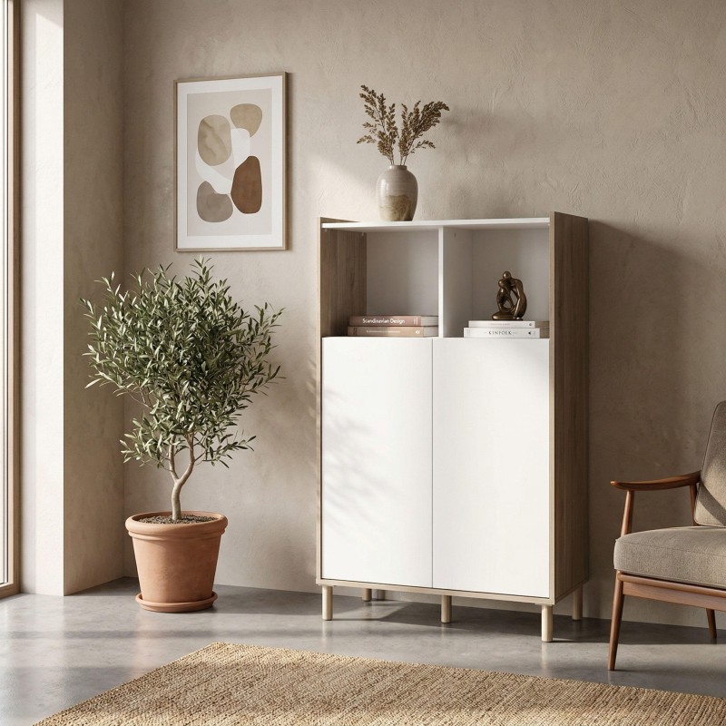 Mueble aparador con puertas blancas y laterales en madera oscura junto a plantas y decoración en ambiente de salón