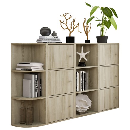 Estantería modular de madera clara con puertas y compartimentos abiertos decorada con libros plantas y accesorios