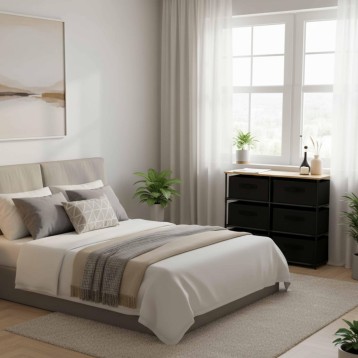 Cómoda negra con cuatro cajones y tablero de madera clara en dormitorio junto a ventana