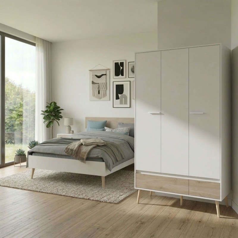 Armario de tres puertas blanco y madera con patas de madera en dormitorio junto a cama