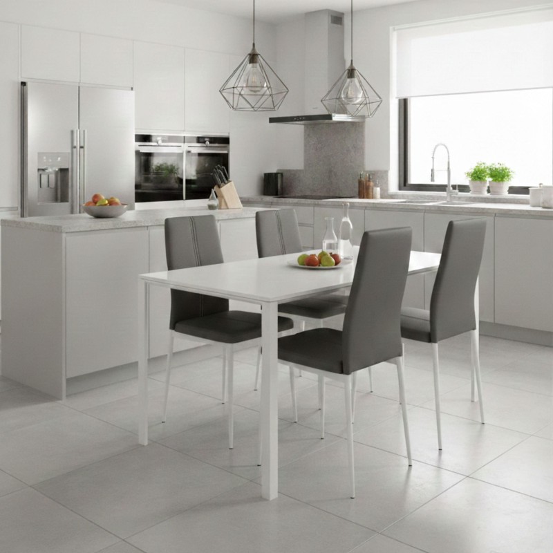 Mesa de comedor rectangular blanca con sillas grises en ambiente de cocina moderna
