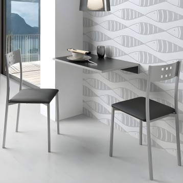 Conjunto de comedor con mesa negra de diseño minimalista y dos sillas grises con asiento negro en ambiente moderno junto a venta