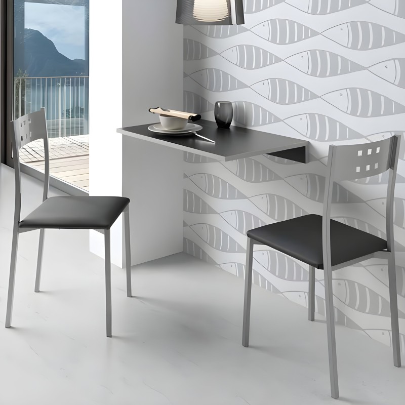 Conjunto de comedor con mesa negra de diseño minimalista y dos sillas grises con asiento negro en ambiente moderno junto a venta