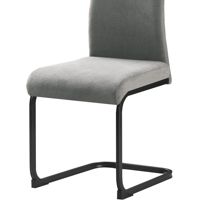 Silla de comedor con tapizado gris y estructura metálica negra en voladizo